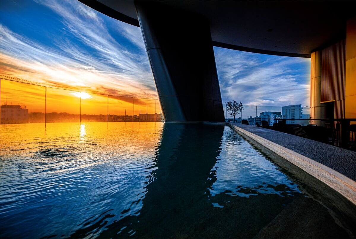 Residents' infinity pool at sunset